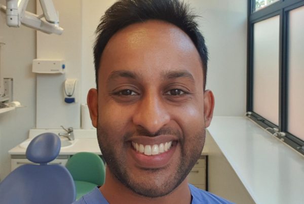 Bevan Fellow Sagar Shah in blue scrubs