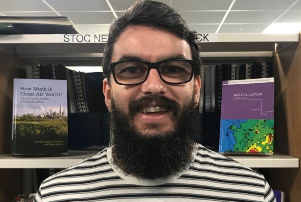 Bevan Fellow Tegid Rhys Williams in a stripey t-shirt